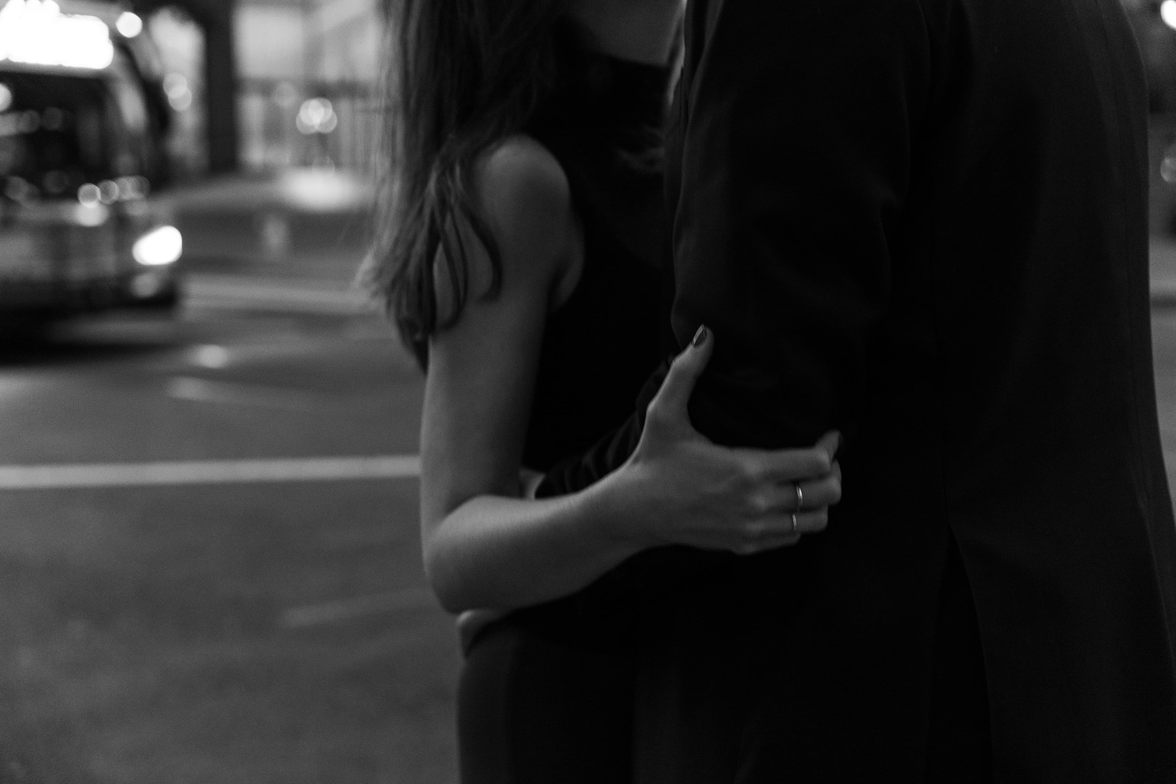 Megan & Sam embracing